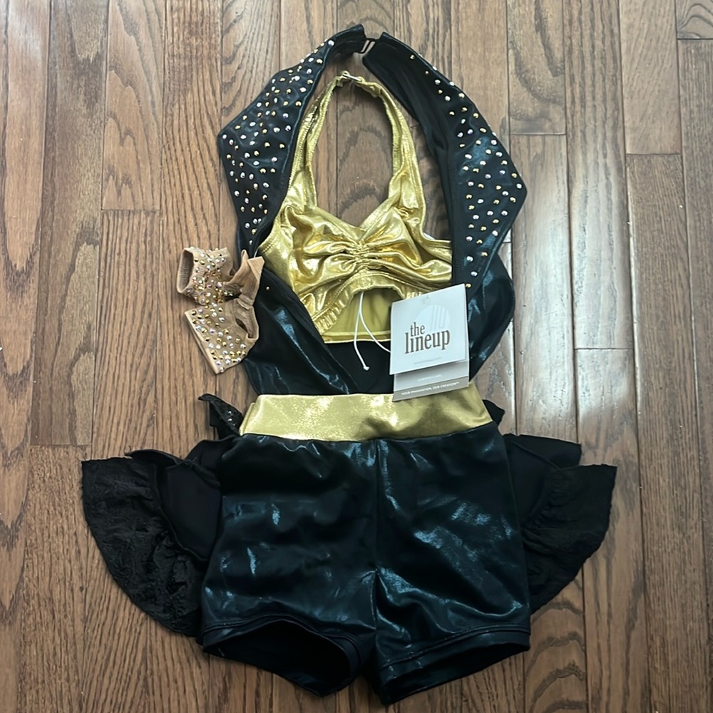 Brand new custom black and gold two piece costume from The Lineup size 10.